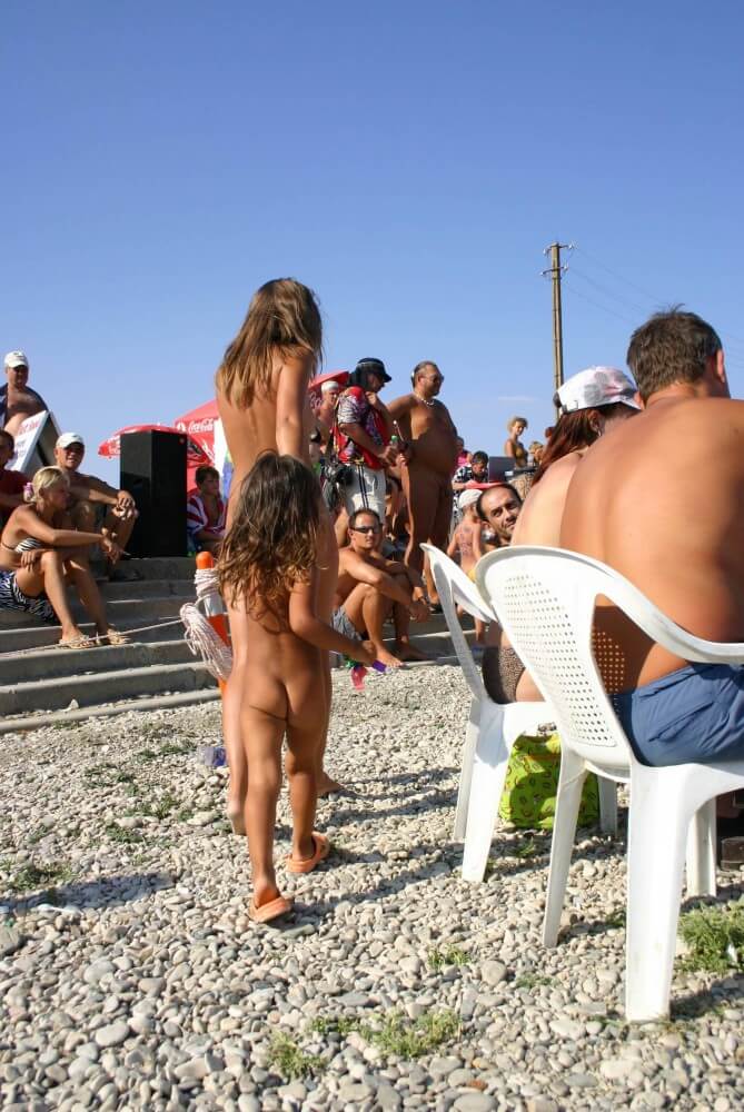 Naturist Standing Sideline - Naturism promotes health of mind and body