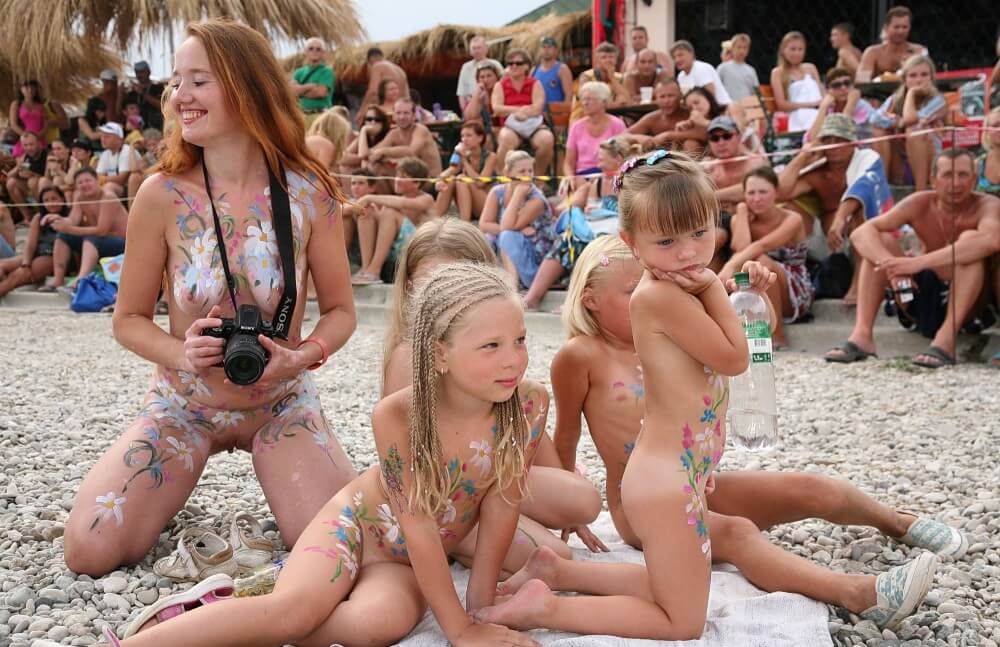 Warm Sand Relaxation photos - Openness to the world and new ideas is a defining trait of naturists and nudists
