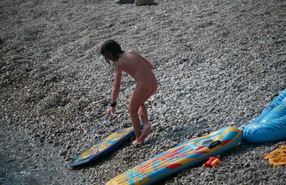 Naturist Surf Board Glides pics - Nudism promotes personal freedom