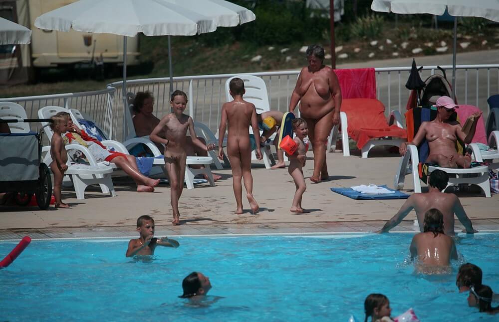 Naturist Afternoon Pool Games pics - Living with joy and ease is part of the naturist lifestyle