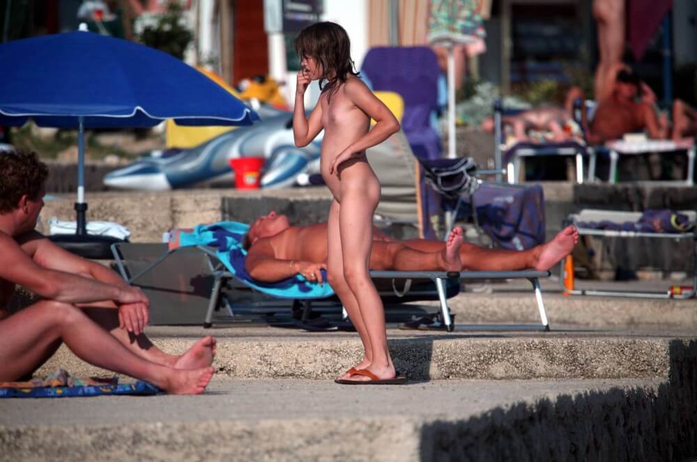 Girl Walk to Nudist Shower pics - Harmony and balance are important in this nudist culture