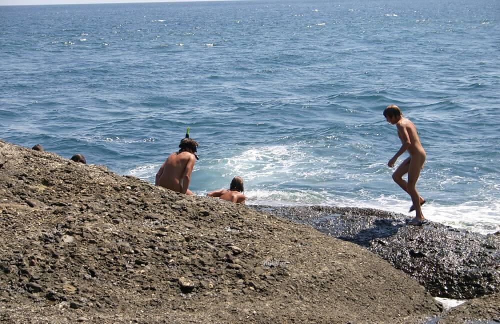 Leaning Against Hit Rocks pics - Nudity is perceived as a natural expression of life